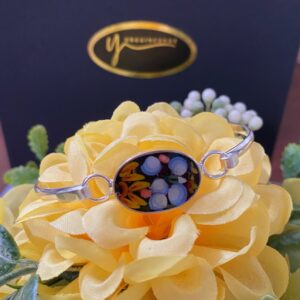 Pulsera ovalada con girasol en filati